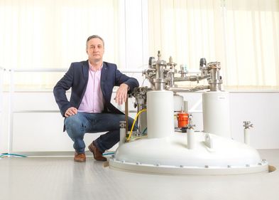 Professor Rustem Valiullin with a nuclear magnetic resonance spectrometer.