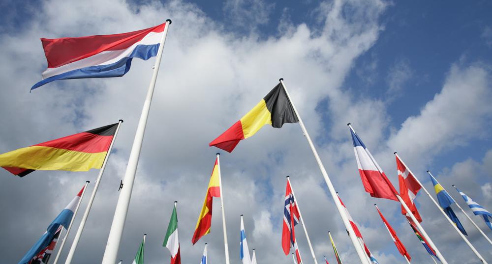 enlarge the image: European flags in the wind