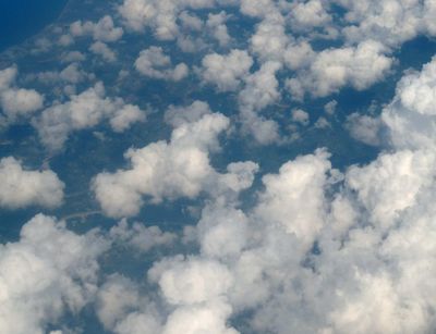 Cumuluswolken fotografiert aus einem Flugzeug. Foto: Katrin Schandert